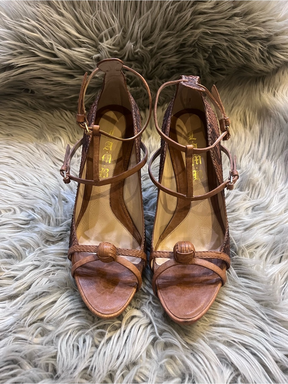 L.A.M.B. Felix snake brown strappy heels featuring a woven leather ball detail